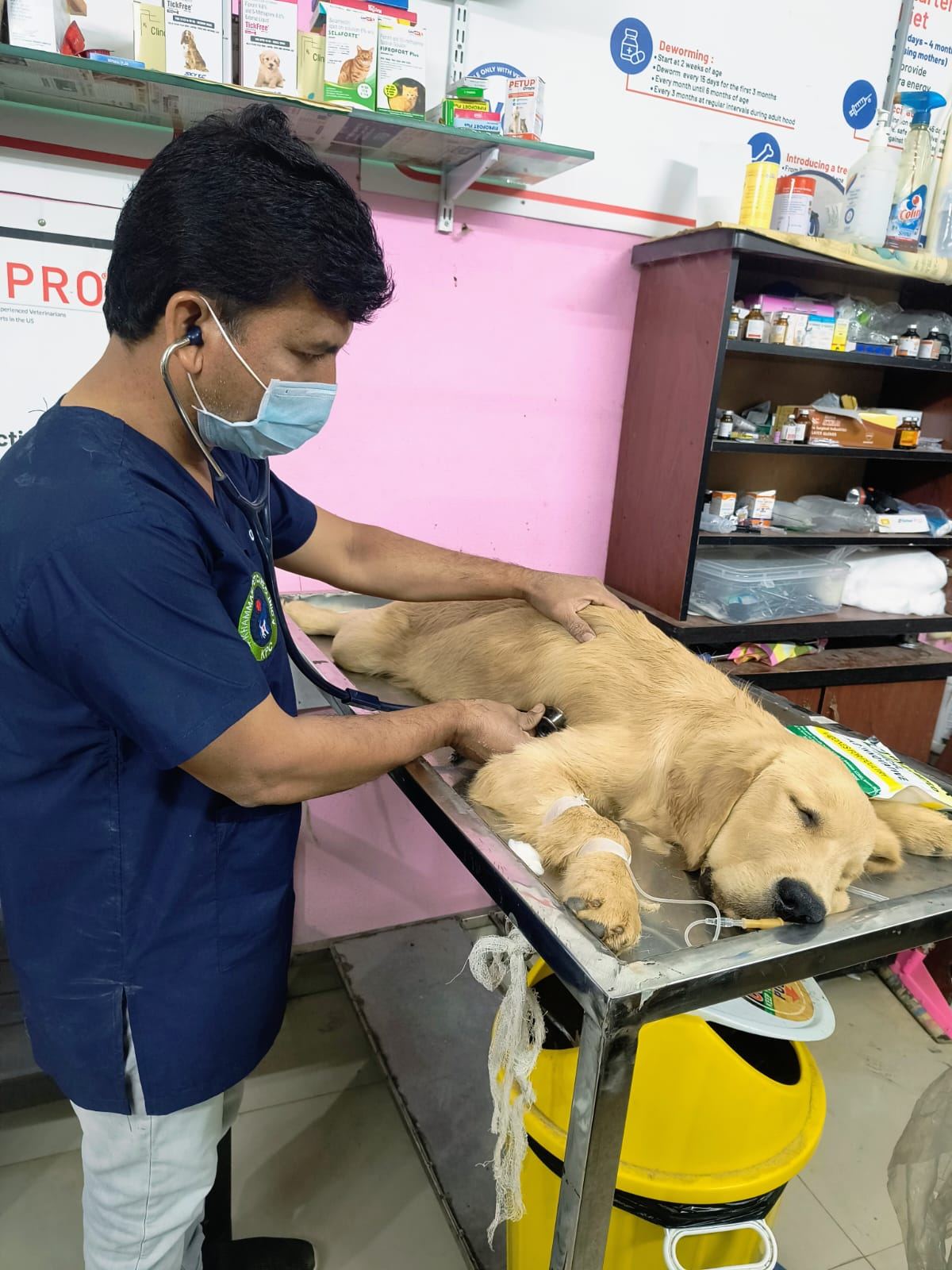 Dr. G. Nagulu examining a patient with a stethoscope